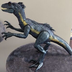 Stealthy Dinosaur Action Figure - Black and Yellow